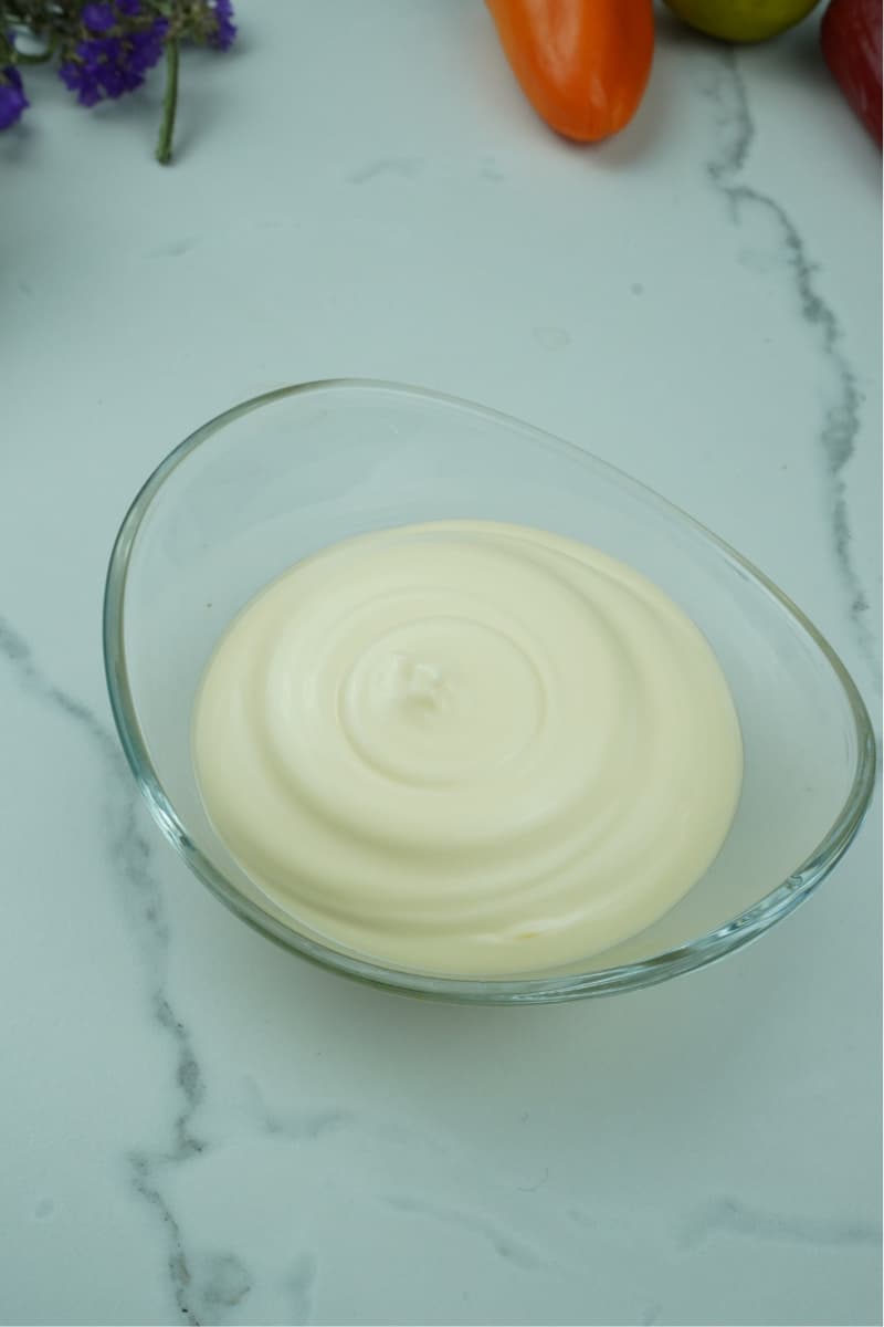 This Olive Oil Mayonnaise Recipe is both simple and delicious. Making and preserving homemade mayonnaise couldn't be easier. Try my recipe today.