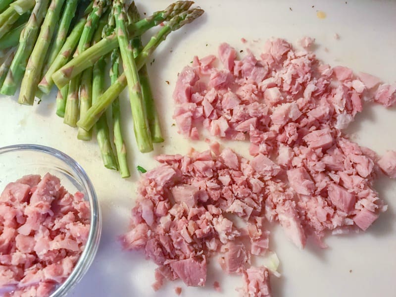 ham and asparagus being chopped