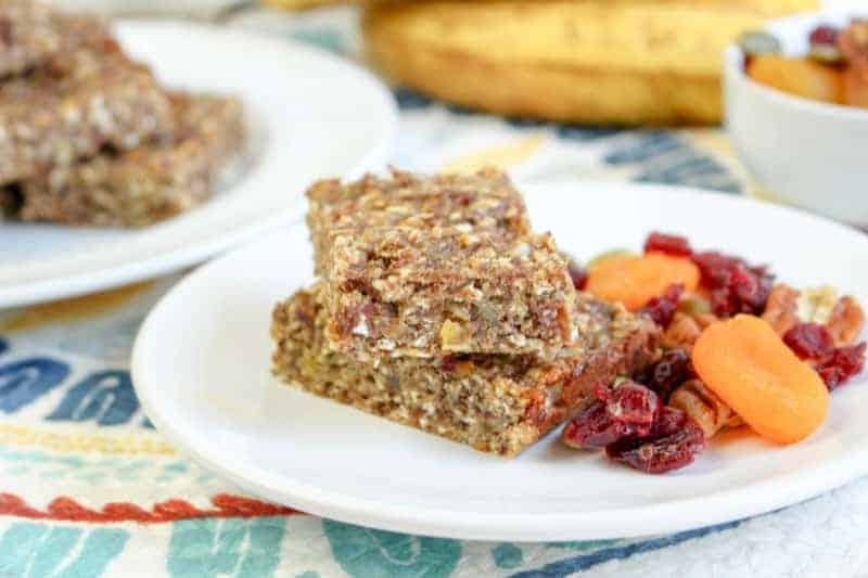 breakfast bars with dried fruit on a white plate