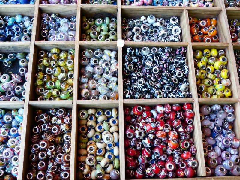 a box full of colorful beads
