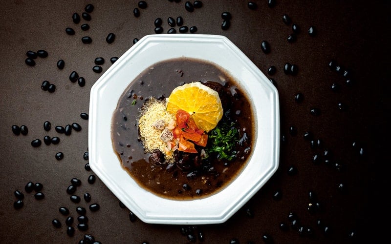 Black bean soup in a white bowl