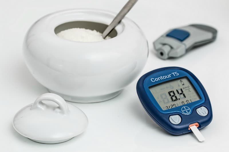 sugar bowl and diabetes meter