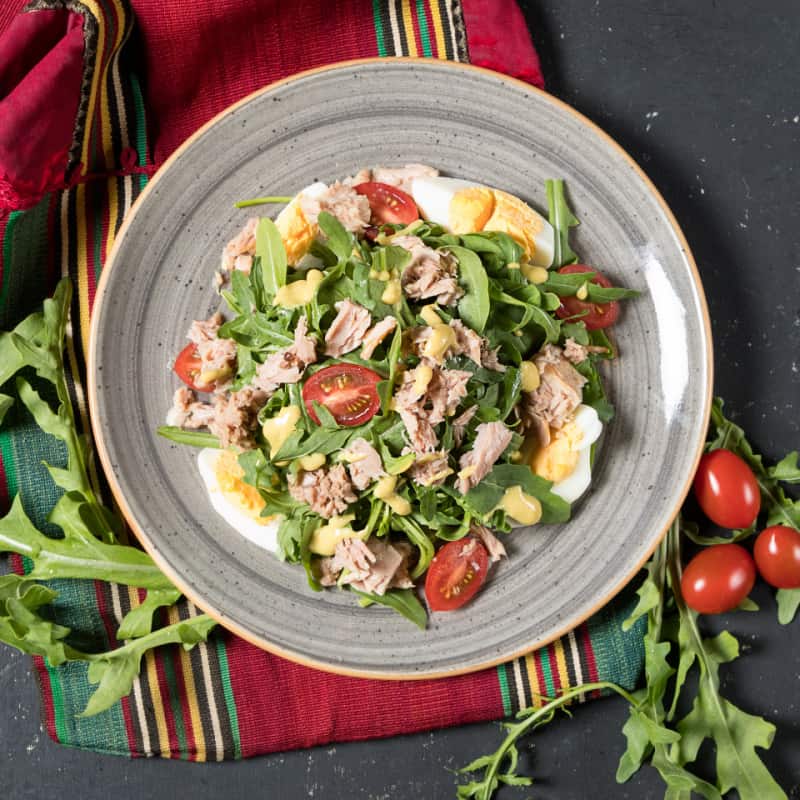 curried tuna salad on a grey plate