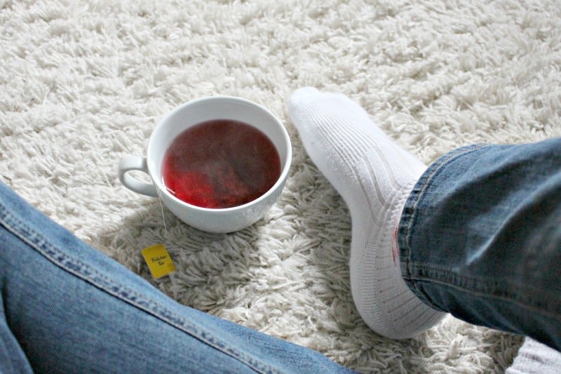 tea cup on a white carpet