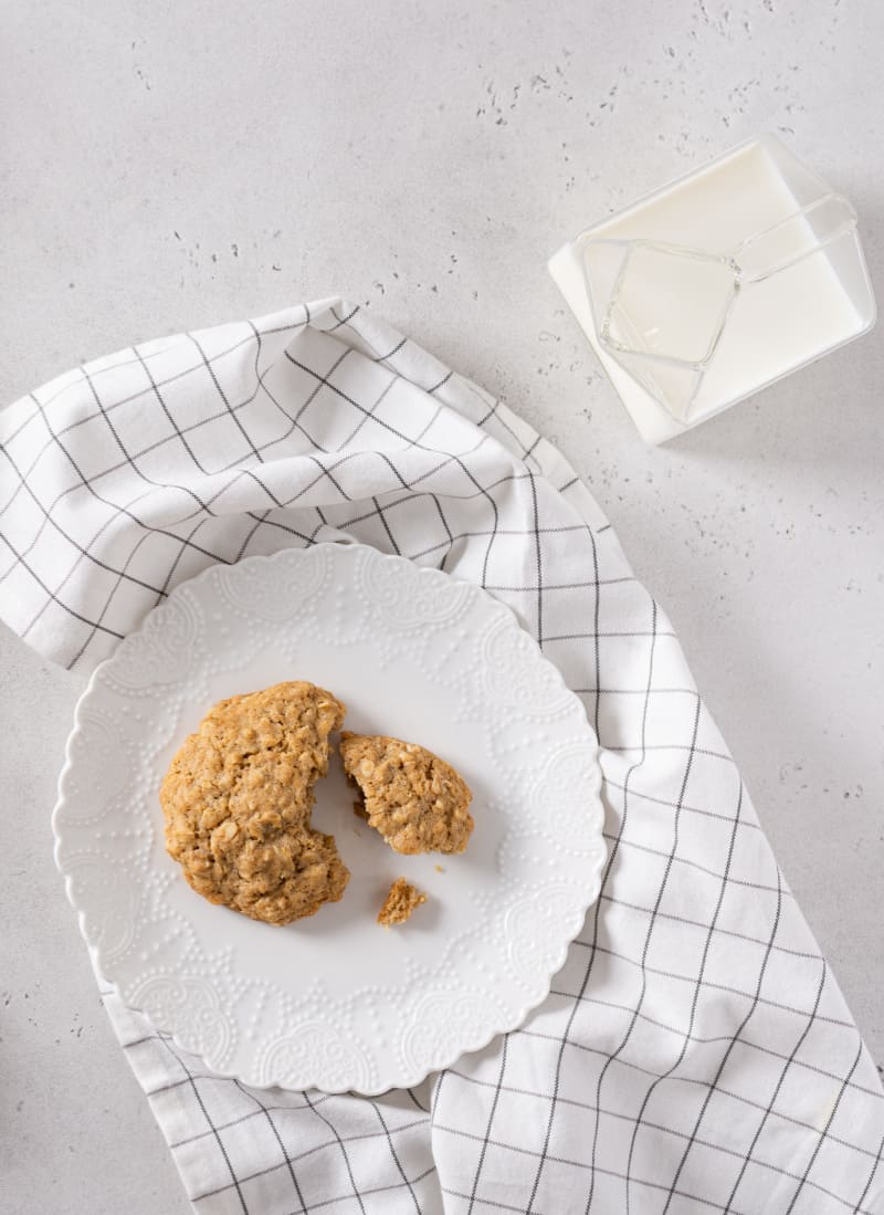 a honey oatmeal cookie on a white plate