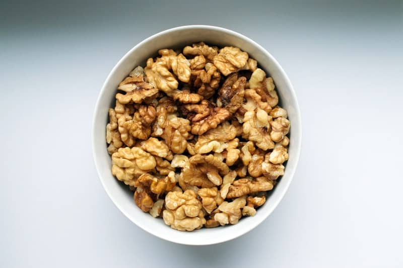 a bowl of chopped walnuts