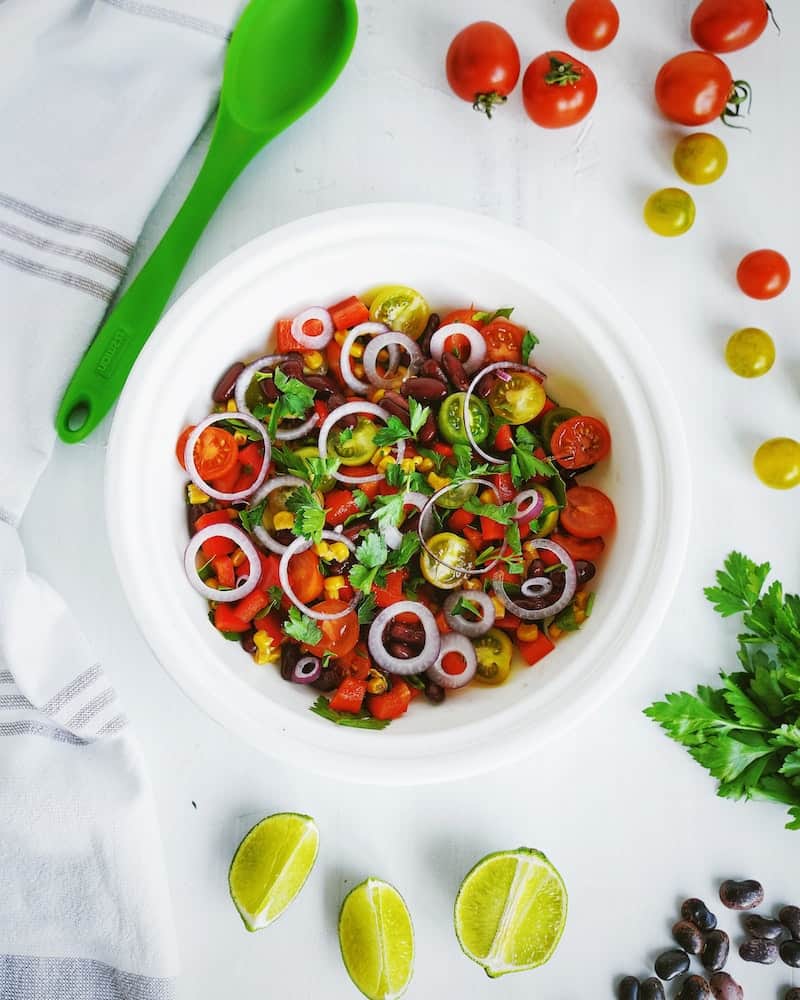 a bowl of tomato and onion salad