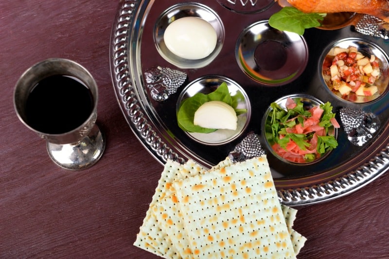 a seder dinner on a silver plate