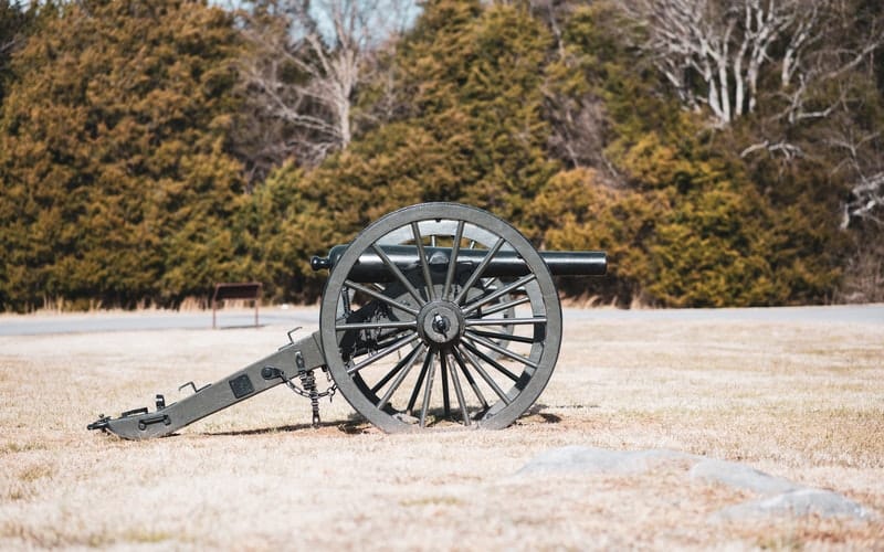 a cannon in a field