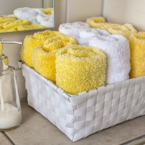 towels rolled neatly in a basket