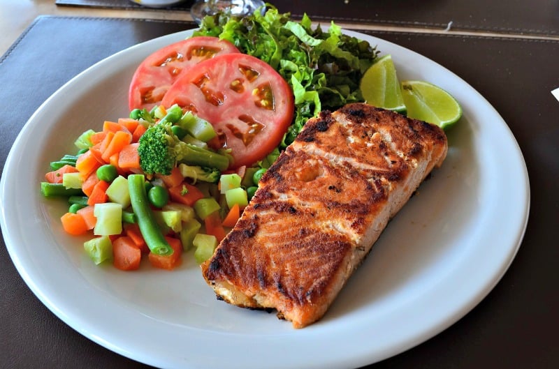 salmon and vegetables on a plate