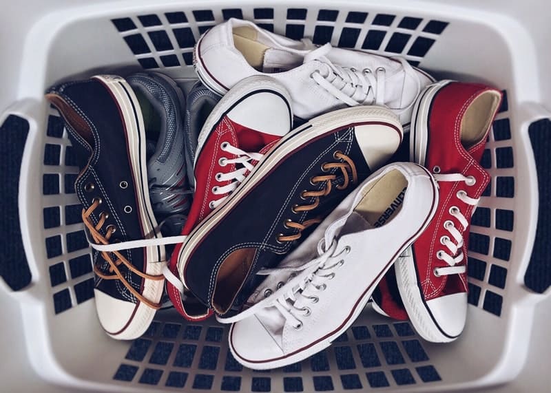 a basket full of athletic shoes