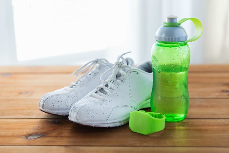athletic shoes and a water bottle