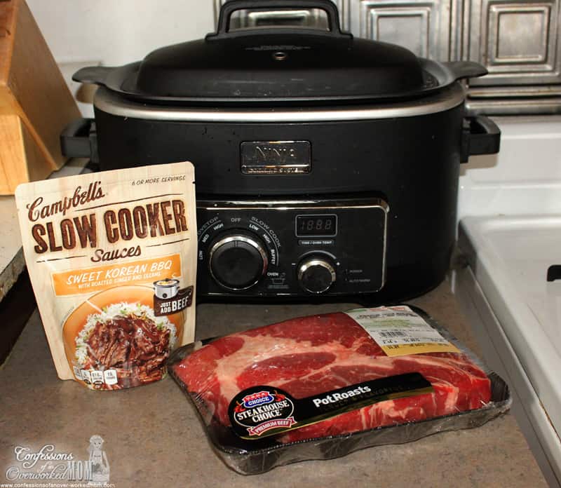 a slow cooker and ingredients on the counter