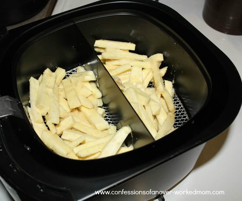 raw parsnips in the basket of an airfryer