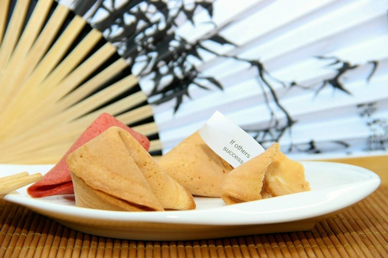 fortune cookies on a white plate