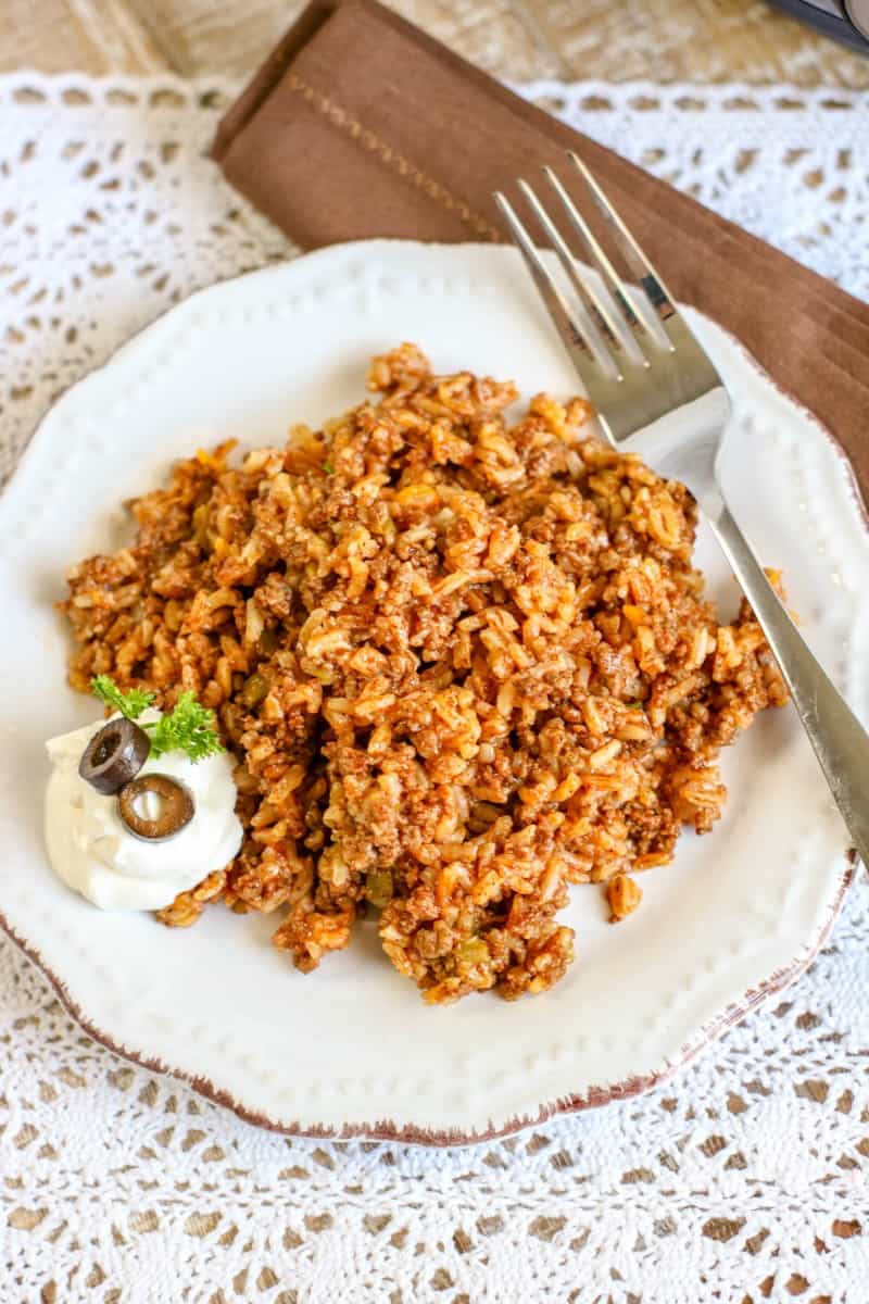 This gluten free Spanish rice is of our favorite busy weeknight meals. Try this Crock Pot Spanish rice recipe today and see how easy it is.