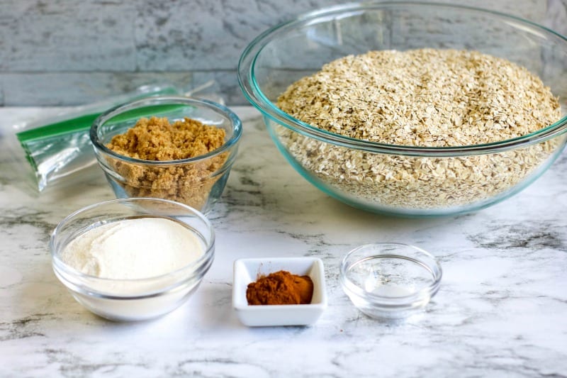 oats, milk, spices and sugar in bowls