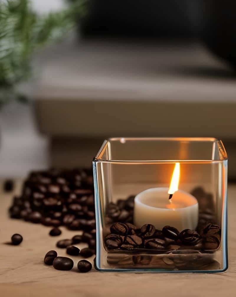 I love being able to freshen indoor air naturally.  Check out this easy coffee bean air freshener you can make by placing a candle in coffee beans.