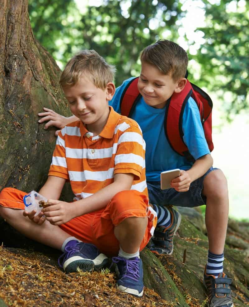 two boys using a health tracker app