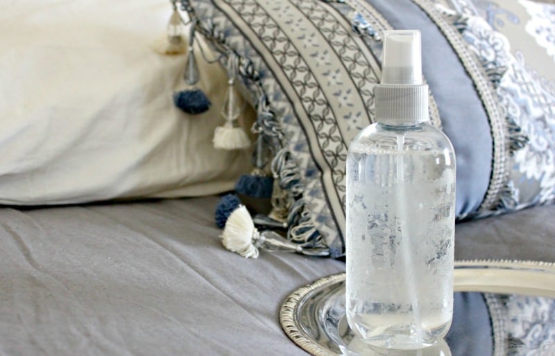 linen spray on a nicely made bed with bedspread