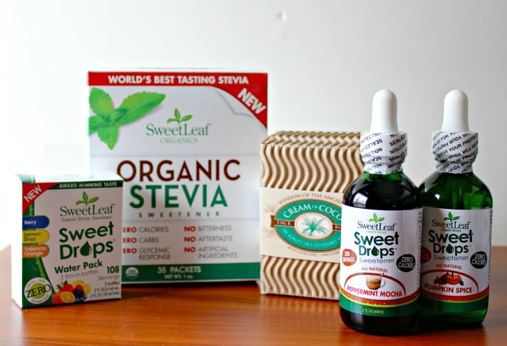 several containers of stevia on a brown table