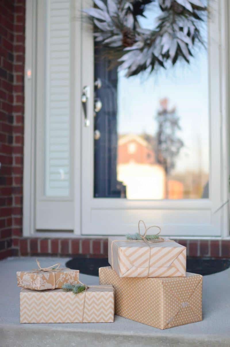 Christmas packages wrapped on the front steps