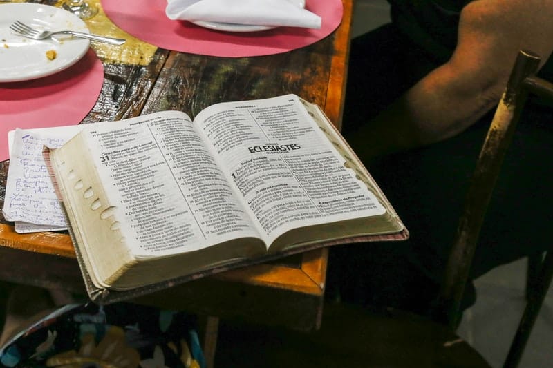 a Bible open on a table