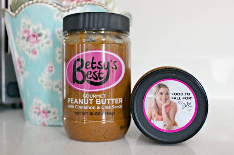 a jar of natural peanut butter on the counter