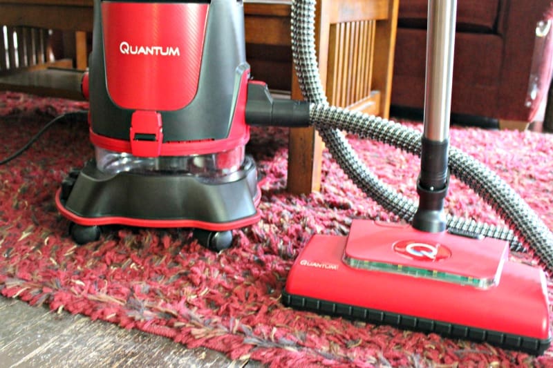 vacuum cleaner sitting on a rug