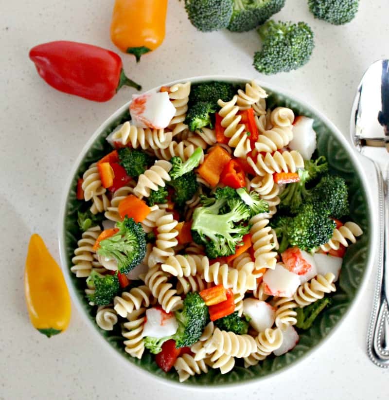 This pasta seafood salad recipe is a family favorite. Make a crab or shrimp and broccoli pasta salad with chunks of fresh garden vegetables.