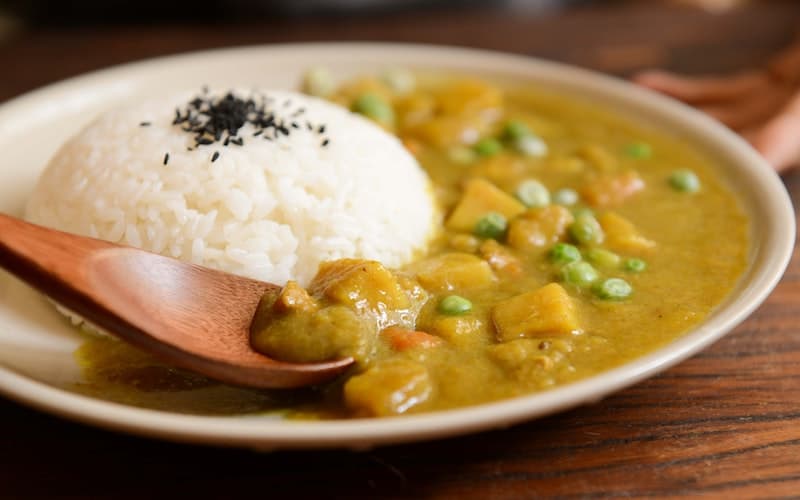 a bowl of curry with rice