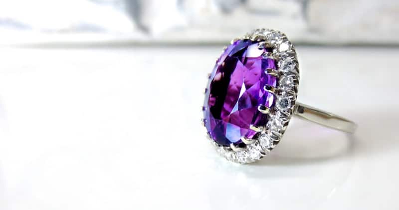 a ring with a purple gem