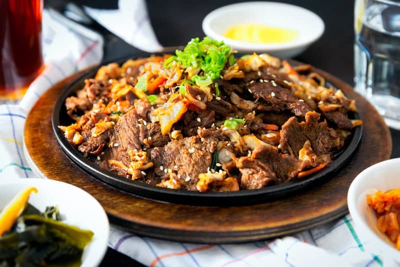 cooked beef and rice on a plate