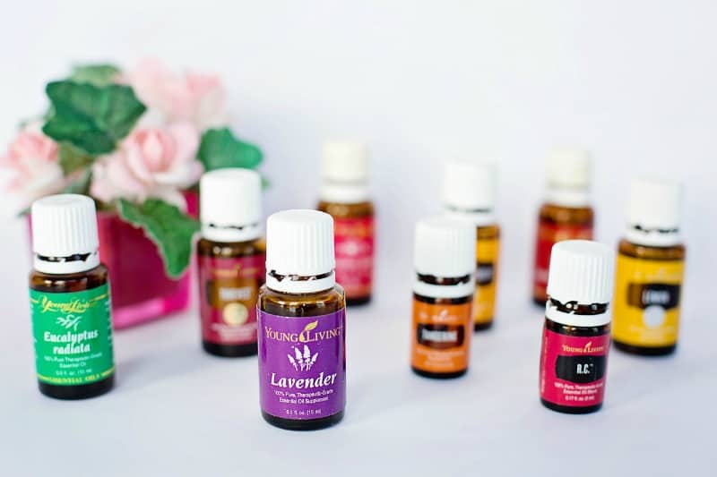 essential oil bottles on a white table