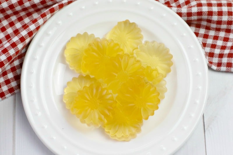 acv gummies on a white plate near a red towel