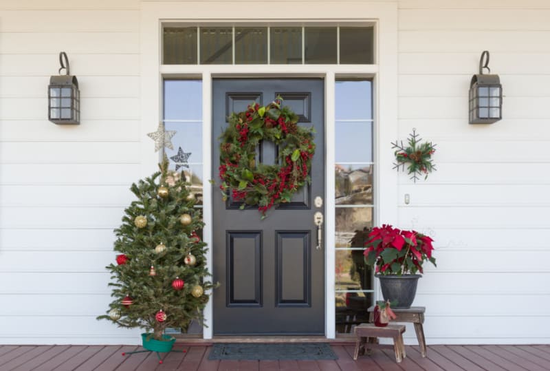 Christmas Decorations At Front Door of House.