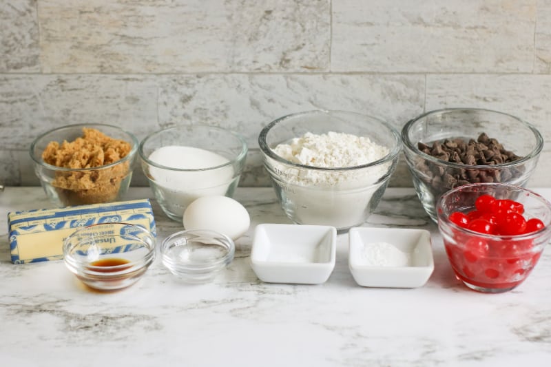 ingredients in clear bowls to make cookies