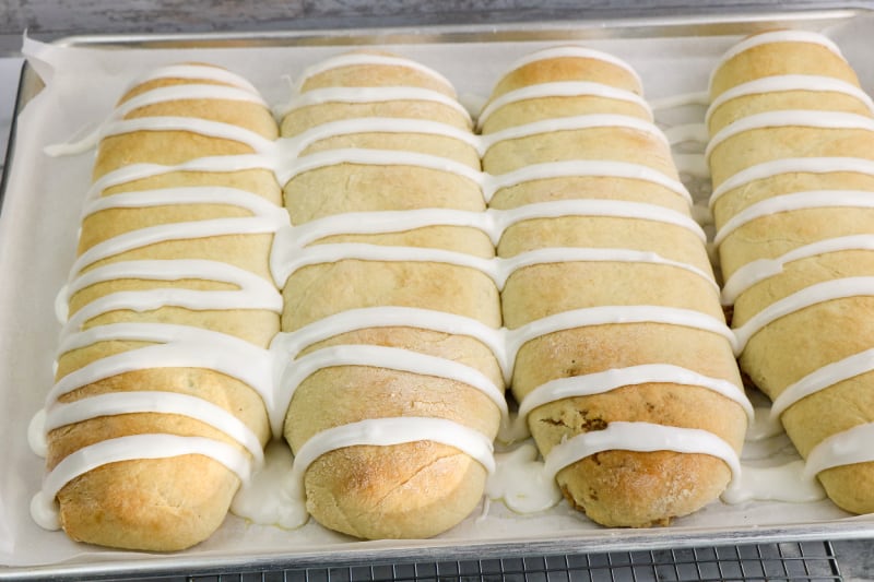 4 Easter nut rolls on a baking sheet