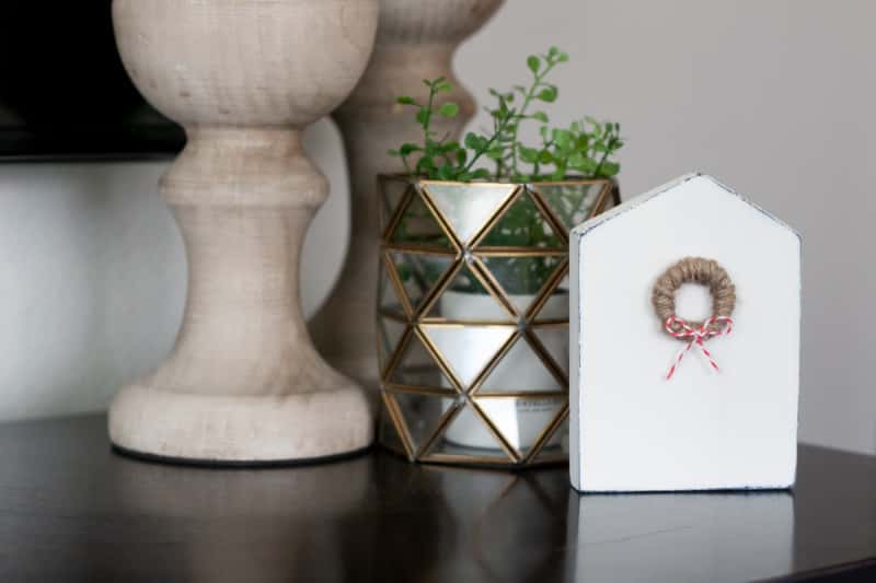 Check out this easy small wooden house craft that's perfect for your mantle. Make your own small wooden house decoration with this tutorial.