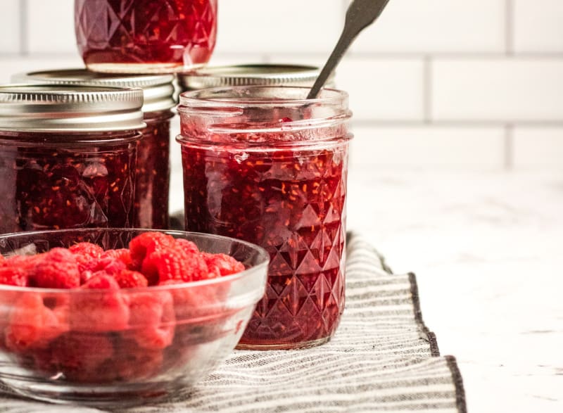 This raspberry jam with pectin is the easiest berry jam recipe ever. Try this homemade raspberry jam recipe on toast, muffins, or as a tart filling.