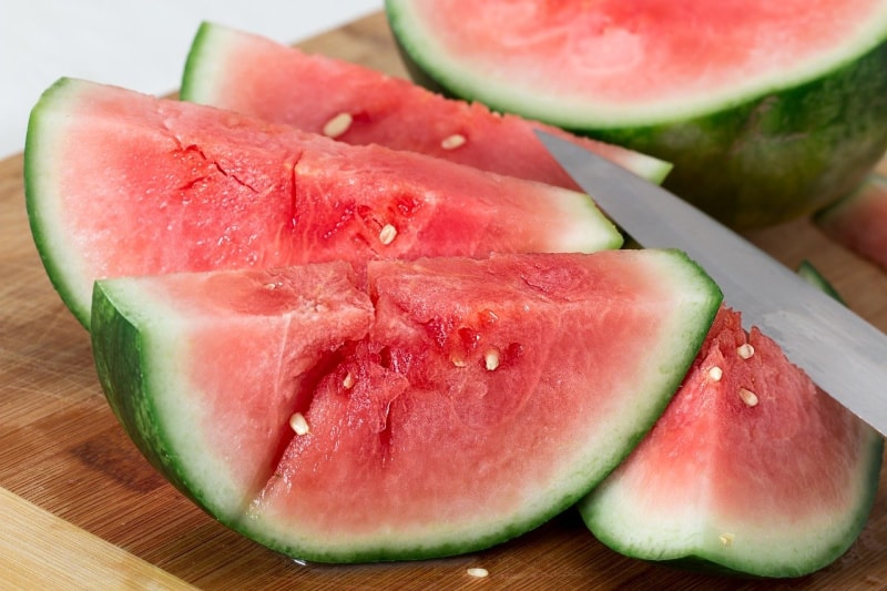 slices of watermelon on a cutting board