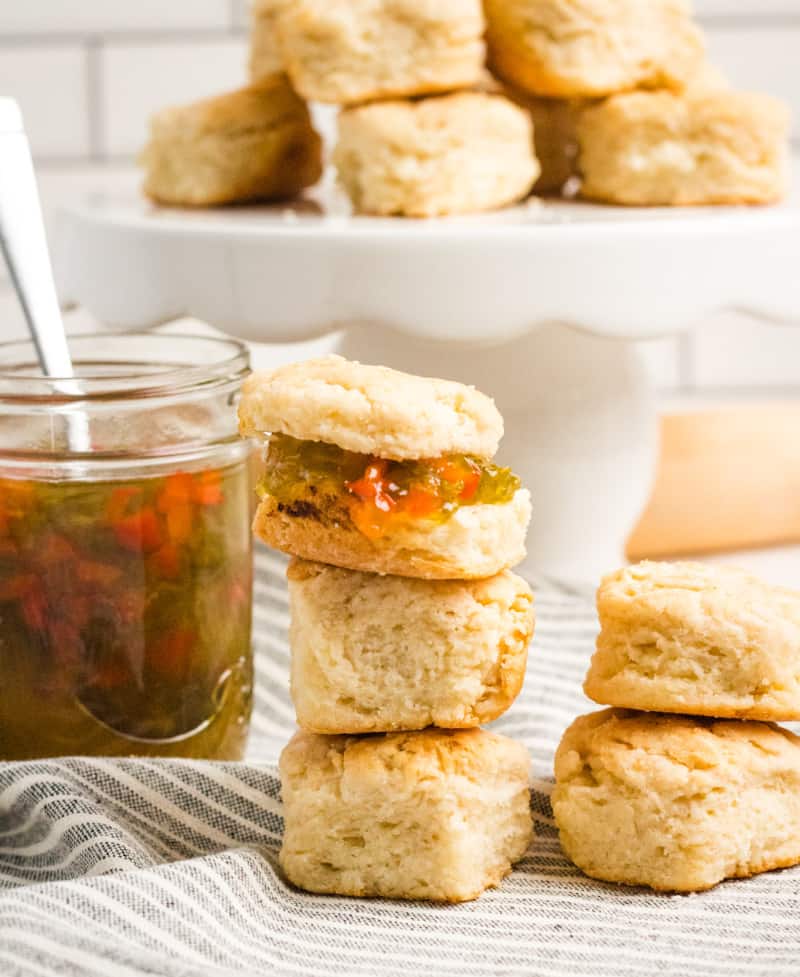 biscuits with jalapeno jam on a white tray