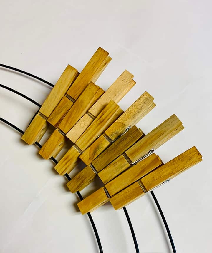 clipping clothespins on a form