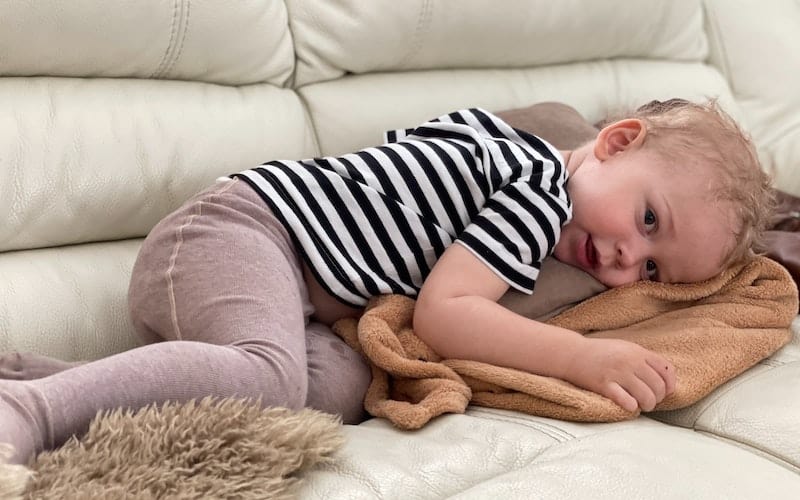 a child napping on the couch