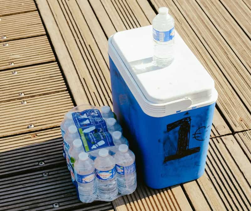 a cooler with bottled water
