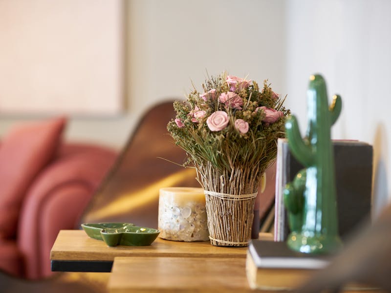 pink flowers on a wooden table