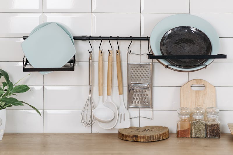 plates and utensils on a rack