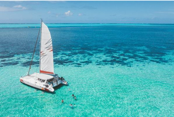 catamaran on blue water