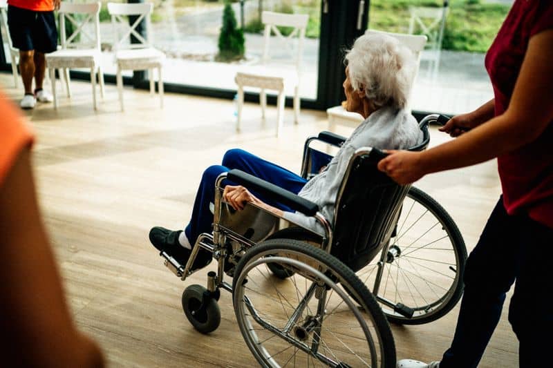 senior sitting in a wheel chair